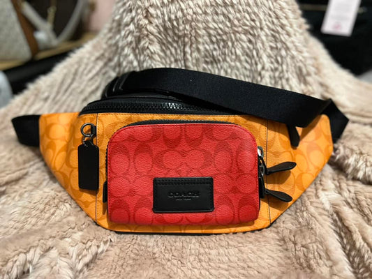 Coach Track Belt Bag in Blocked Signature Canvas - QB/Light Orange Multi