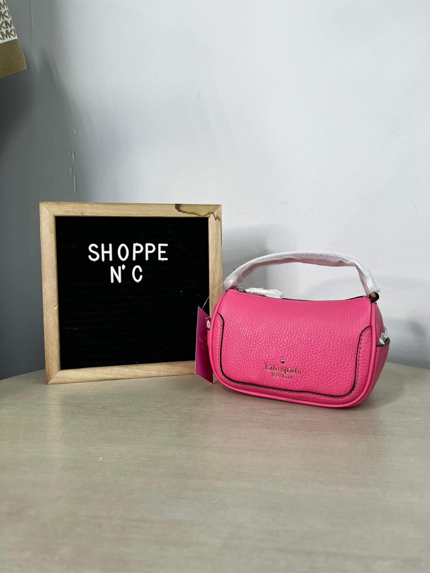 Kate Spade Smoosh Pebbled Leather Micro Crossbody Bag - Bright Blush